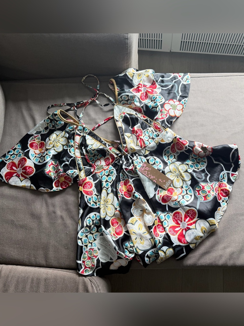 Jolie Black Floral Cutout Sleeve Top with Red, Yellow & Teal Accents